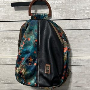 81. Floral Women's Backpack with Black Accents